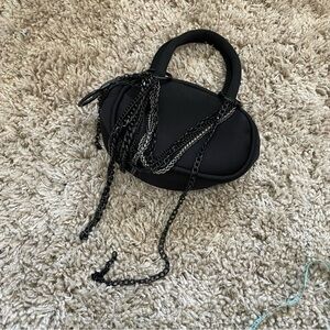 DOLLS KILL PLAYER ONE BLACK NEOPRENE BAG POSTER GRL